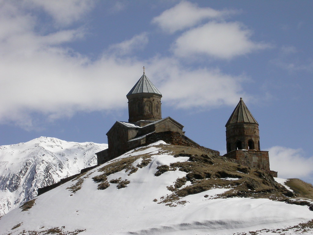 Gergeti Trinity Church overlooking Stepantsminda and Mount Kazbek Gergeti Trinity Church overlooking Stepantsminda and Mount Kazbek